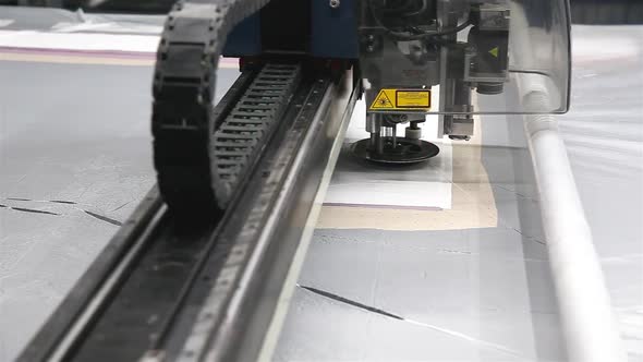 a special Laser Cutting Fabric cuts out certain textile pieces