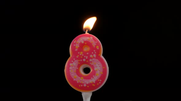 Birthday Cake Number 8 Pink Donut Candles Burning By Lighter Black Background