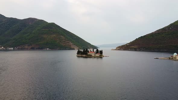 Two Islands with Small Buildings in a Bay