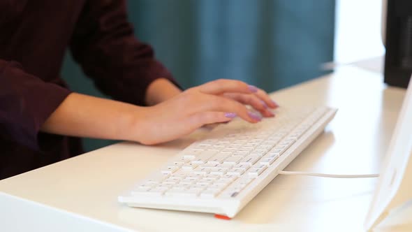 Muslim Woman Typing On The Keyboard