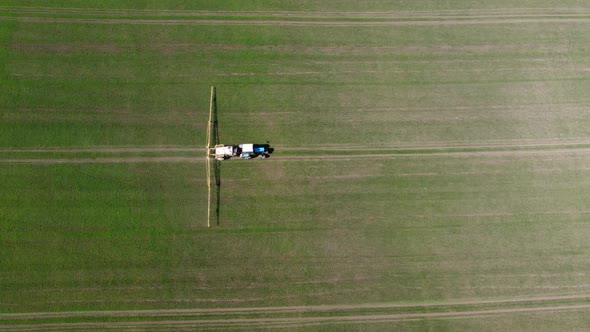 Processing of Agricultural Fields with Fertilizers and Pesticides From Weeds and Pests