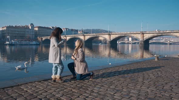 Lesbian Girl Proposing to Her Girlfriend to Get Married alt