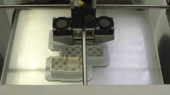Technology. The Work of a Three-dimensional Printer. 3D Printer During Printing Close-up. Process of alt