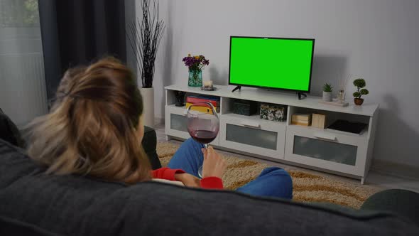 Woman Watching TV Greenscreen and Chroma Key. alt