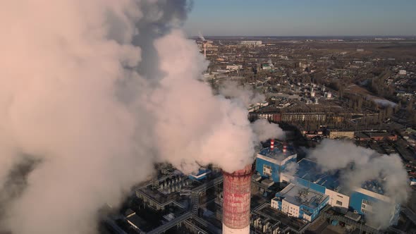 Industrial factory pipes emission carbon gases in atmosphere alt