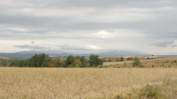 Eastern Serbia landscape with cloudy sky slow tilt 4K 2160p 30fps UltraHD footage - Famous Stol and  alt