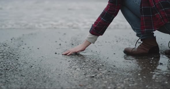 Man Standing on the Seashore on Rain Day , He Took alt