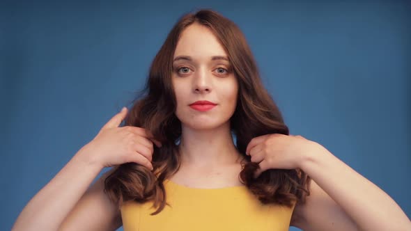 Brunette Enjoying Shining Long Hair After Beauty Salon