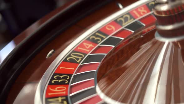 Shooting at an Angle The Small Ball Into the Slot As the Roulette Wheel Spins