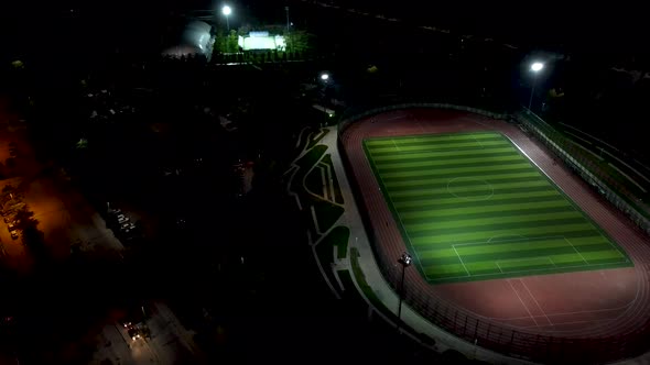 aerial view of a football field at night