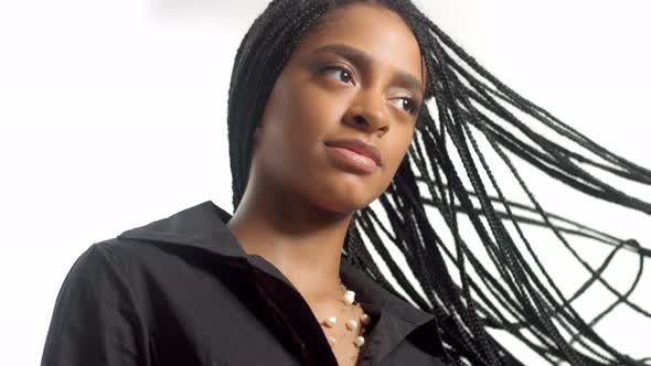 Mixed Race Woman with Hair Braids in Studio on White Closeup Portrait