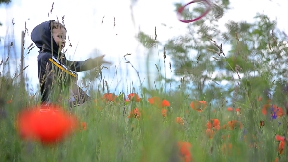 Boy Playing in the Chain of Poppies 01