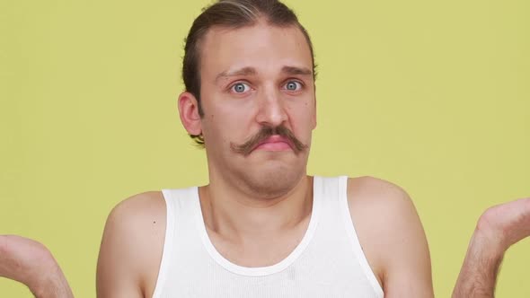 in Slow Motion Emotional Man with Blue Eyes Shrugging Showing Surprise and Expressing Lack of alt