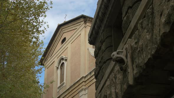 Low angle view of an old wall near a church