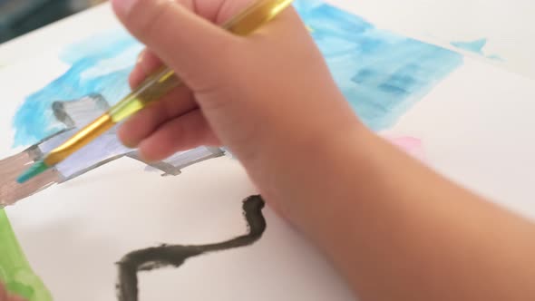 Close Up Talented Little Girl Female Artist Draws Mother Sun Summer Flover Drawing at Home