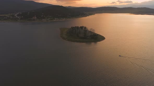 Lake Landscape Sunrise Over Water Cinematic Drone Footage - Shot of A Dam in Bulgaria at Sunset alt