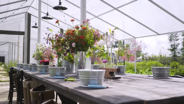 Festive Fresh Flower Bouquet on Table in Greenhouse