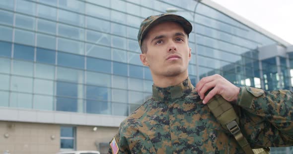 Portrait of Soldier Walking Outdoors alt