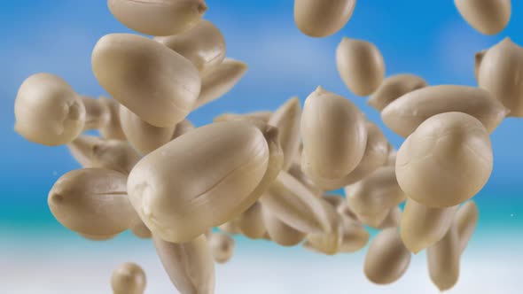 Flying of Roasted Peanuts in Sky Background alt