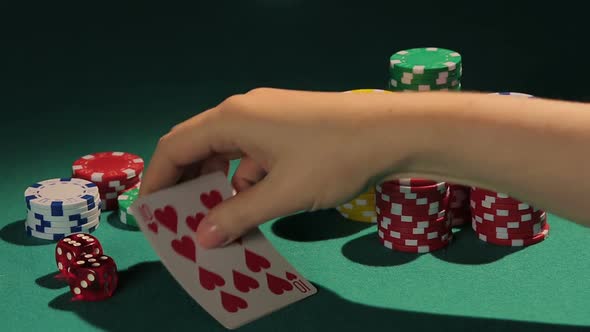 Happy Female Poker Player Showing Best Poker Combination, Royal Flush Hand alt