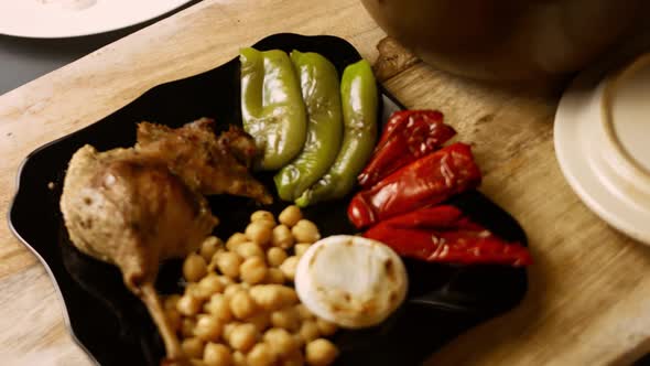 I Put the Vegetables Over the Duck Pieces and Chickpeas alt