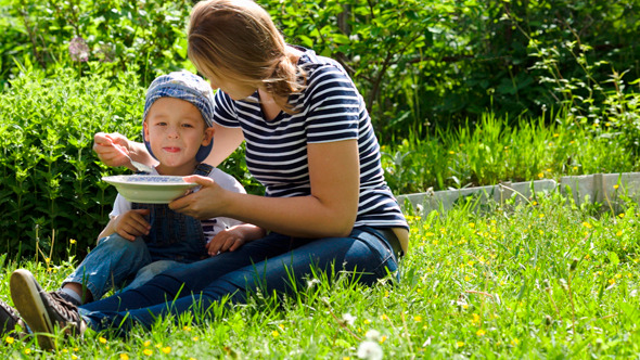 mother feeding her child