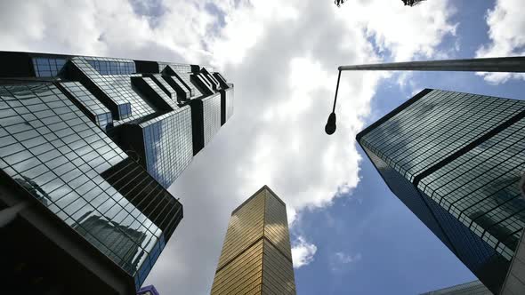 Upshot clouds on tall building glass delay alt