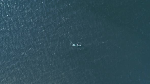 Lonely Boat at Sea