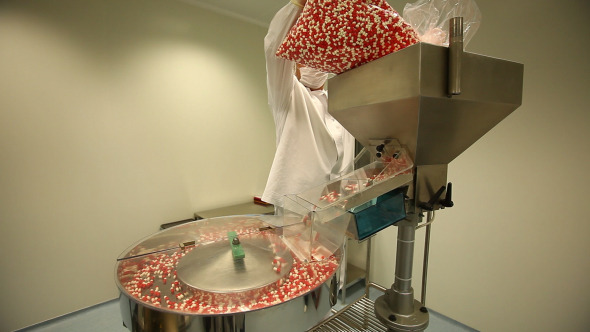 Pharmaceutical Staff And Equipment At Work