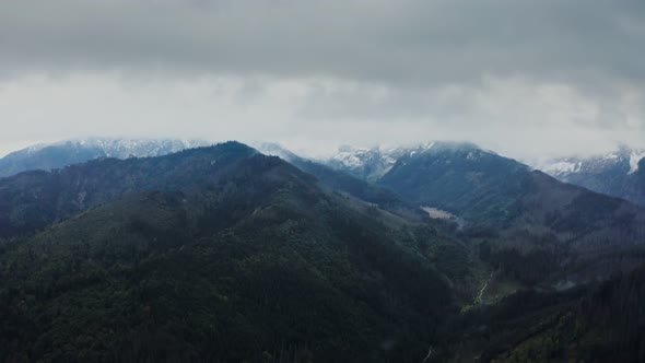 View of the Mountain Valley with a Lake in a Lowland alt