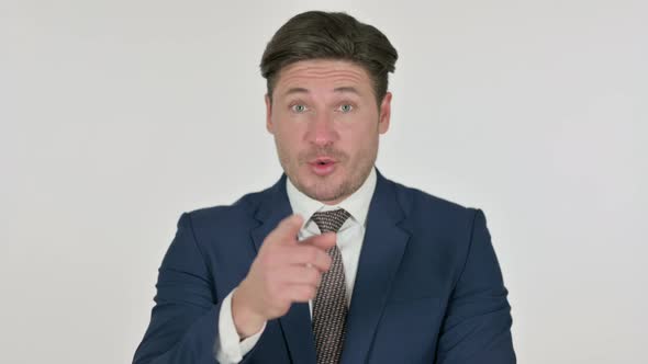 Middle Aged Businessman Talking on Online Video Call, White Background alt