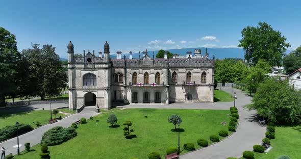 Zugdidi, Georgia - May 30 2022: Aerial view of Dadiani Palace in the center of Zugdidi city alt