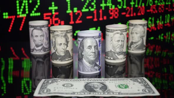 American Dollars Against The Background Of Stock Market Financial Data 3.