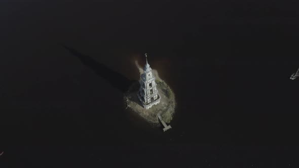 Aerial footage of flooded Kalyazin Bell Tower on Volga River. Uglich Reservoir, Kalyazin, Russia.