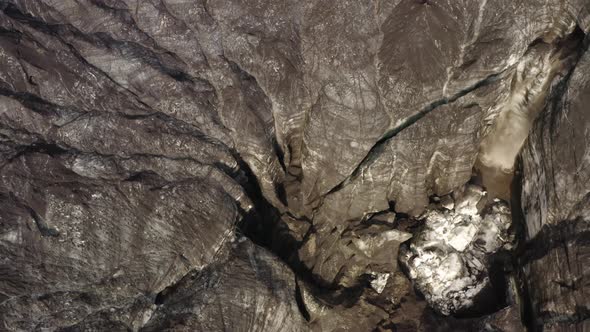 Waterfall With Water Flowing From Cave In A Lobe Of Myrdals Glacier On Katla Volcano In Iceland. alt