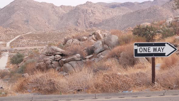 One Way Road Sign Arrow Highway Roadside in California USA Road Trip in Desert