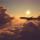 Airplane Flying Above the Clouds on Sunset 4k - VideoHive Item for Sale