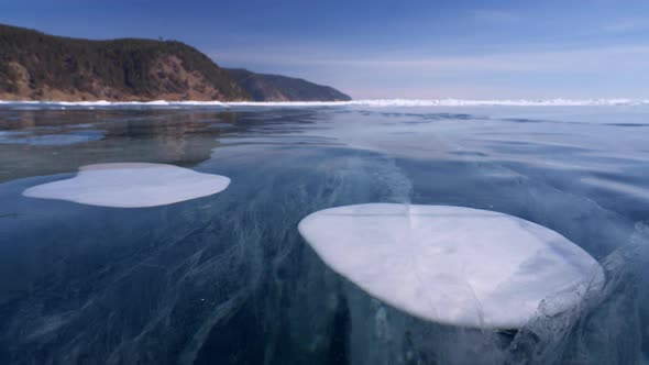 Cracks and Bubbles Inside Ice on Frozen Baikal Lake Dolly Slideways Motion