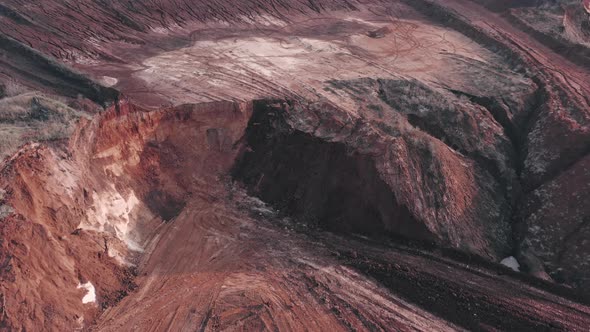 The Texture of Red Clay in the Quarry  Clay Landslide with Cracks From Erosion