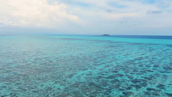 Maldive Reef with Turquoise Blue Water Aerial View