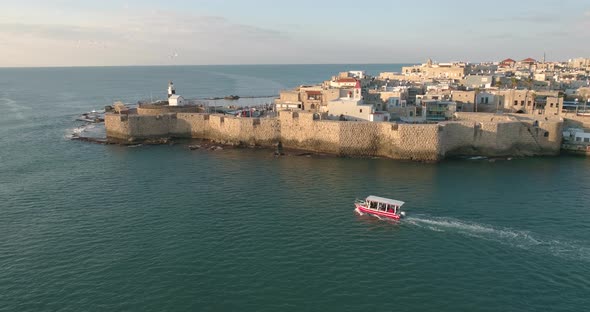 Aerial view of natural water pool along the coast in Acre Old town, Israel. alt