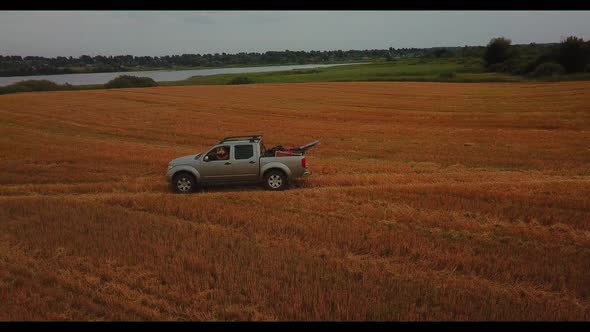 Flyby of a Pickup Truck in a Wheat Field