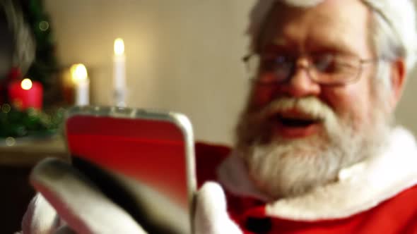 Santa claus using mobile phone alt