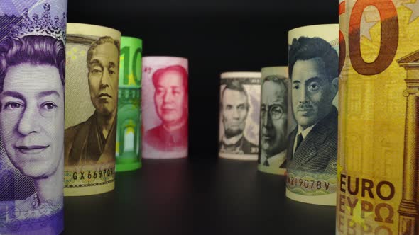 Foreign currency money exchange concept. Many banknotes of different nations. alt