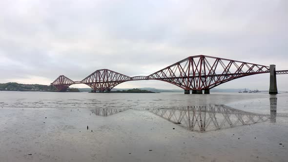 A Railway Bridge Crossing the Forth of Firth in Scotland alt