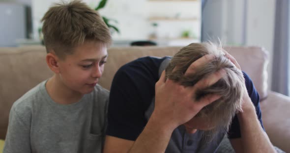 Caucasian man spending time with his son together alt