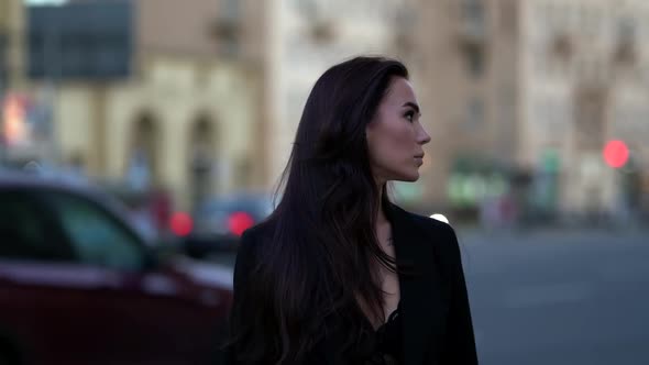 Gorgeous Brunette Woman Is Walking Alone at City in Summer Evening, Beautiful and Lonely Lady alt