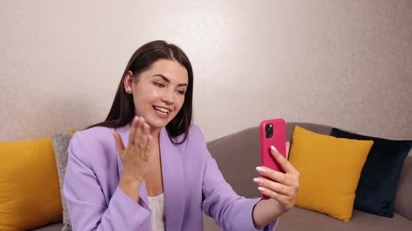 Female Blogger in Networks on Smartphone Via 5g Internet Connection Resting alt