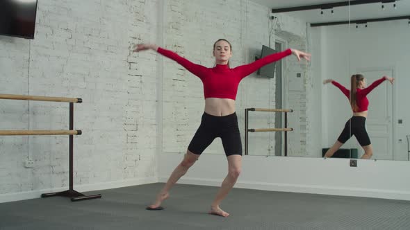 Athletic Female Doing Crossover Lunge with Fitness Disc alt