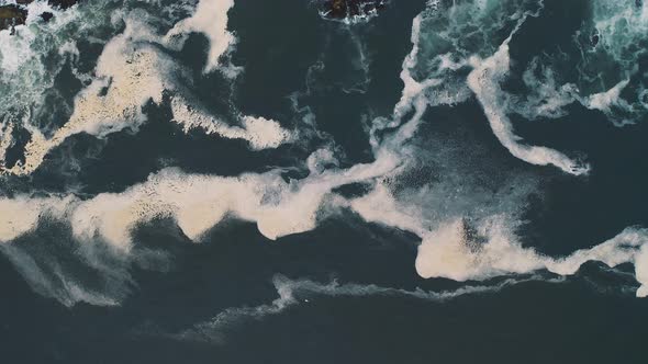 Zenital shot during sunset of Pacific Ocean, the coast in Peru 4K alt